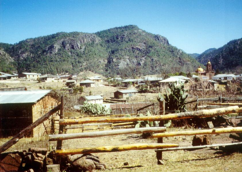 Landscape and village in N. Mexico - click to go back